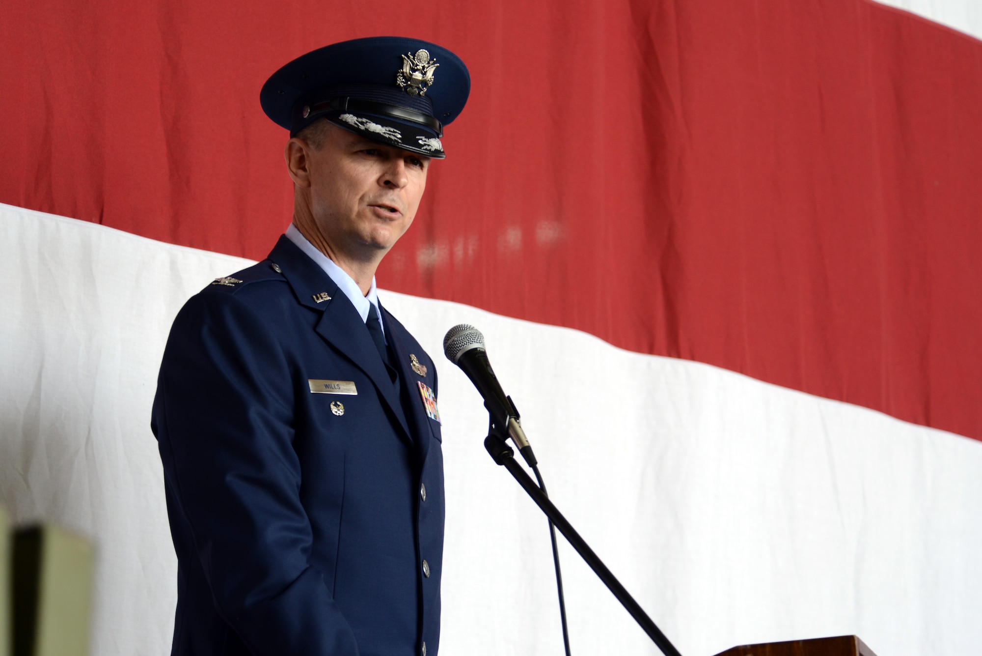 Col. Craig Wills, 39th Air Base Wing commander, speaks to Airmen during the wing’s change of command ceremony July 9, 2013, at Incirlik Air Base, Turkey. The ceremony is a tradition in which authority and responsibility for a unit is transferred from one officer to another. Prior to coming to Incirlik AB, Wills served as the Deputy Assistant Chief of Staff for Operations, United States Forces Korea. (U.S. Air Force photo by Tech. Sgt. Dallas Edwards/Released)