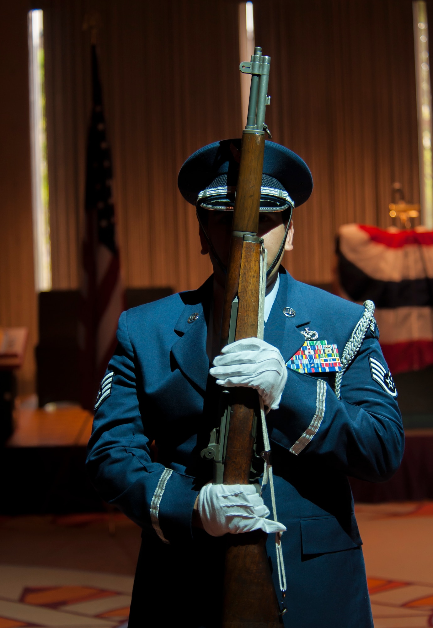 Staff Sgt. David Eiler, Yokota Air Base Drill Team head trainer, holds a M1 Garand rifle during the Independence Day Ceremony at the Tokyo American Club June 30, 2013. Yokota’s drill team, formed in 2013, is the only drill team in the Pacific Air Force. (U.S. Air Force photo by Senior Airman Michael Washburn)