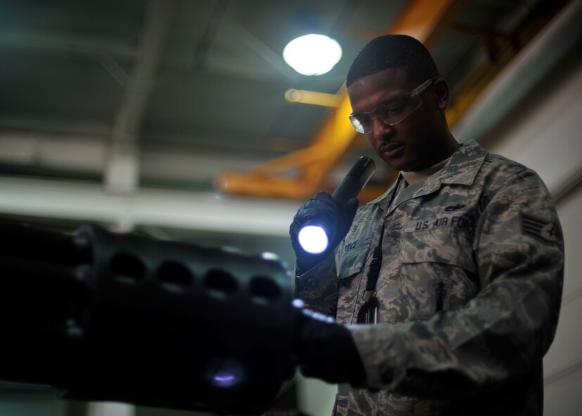 Staff Sgt. Marquette Price, 51st Munitions Squadron aircraft armament systems and weapons technician, administers a seven-level inspection on an A-10 Thunderbolt’s 30-mm gun at Osan Air Base, Republic of Korea, July 1, 2013. Price is this week’s Airman Spotlight winner. (U.S. Air Force photo/Senior Airman Siuta B. Ika)