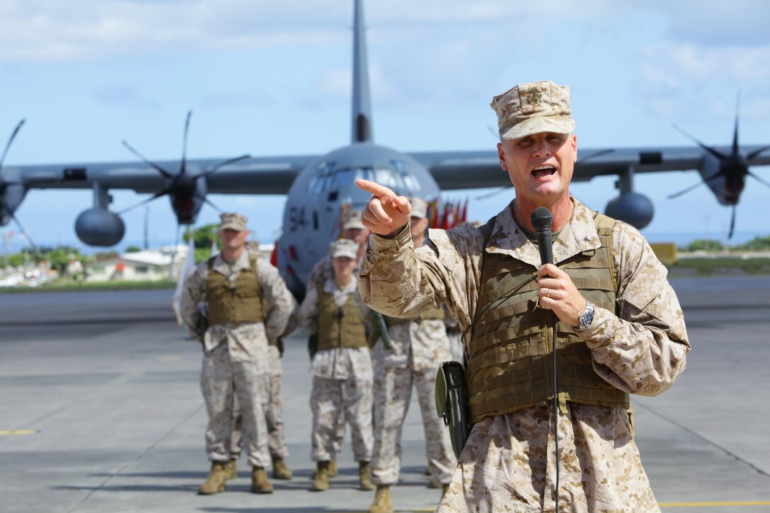 Brig. Gen. Steven R. Rudder expressed his intent to build upon 1st Marine Aircraft Wing’s past successes during the 1st MAW change of command ceremony July 9 at Marine Corps Air Station Futenma. “When the commandant and the other general officers back in D.C. talk about this MAW, they talk about all the great things that have been accomplished…and I intend to continue leading this MAW to greatness,” said Rudder. Rudder relieved Maj. Gen. Christopher S. Owens as commanding general of 1st MAW, III Marine Expeditionary Force. (U.S. Marine Corps photo by Lance Cpl. Natalie M. Rostran/Released)