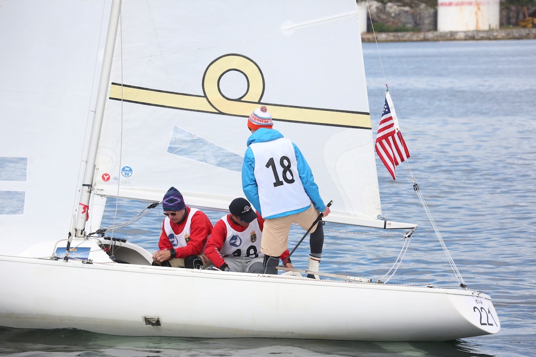 (Left to Rigth) Navy LCDR Luke Suber, Coast Guard LTJG Jonathan Duffett and skipper Navy ENS Taylor Vann at work during the 2013 CISM Sailing World Military Championship in Bergen, Norway 27 June to 4 July.