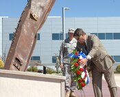 Don Addy, president and CEO of the National Homeland Defense Foundation, lays a wreath at the North American Aerospace Defense Command and U.S. Northern Command headquarters 9-11 memorial during a memorial service Sept. 10, 2010. 

