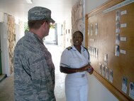 Bahamian Senior Lt. Sonia Miller, Royal Bahamas Defense Force Public Relations Officer, gives Air Force Capt. Dustin Hart, North American Aerospace Defense Command and U.S. Northern Command Public Affairs officer, a briefing on the RBDF command structure during an information exchange with Bahamian governmental departments Sept. 7, 2010. USNORTHCOM Public Affairs personnel met with members of the Bahamian government to exchange information on how each office conducts public affairs operations. 

