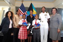 U.S. Ambassador to The Bahamas Nicole A. Avant donated $10,000 in books to the Ministry of Education Oct. 5 to support the United States Embassy-initiated “Read To Lead” program. Funding for the book donation was provided by the U.S. Northern Command as part of its long-standing partnership with the island nation. On hand for the official book handover was Deputy Assistant Secretary, Western Hemisphere Affairs, Julissa Reynoso; Delores Ingraham, President, New Providence Association of Public High Schools; Alexis Thompson, student, Sadie Curtis Primary School; U.S. Ambassador Nicole A. Avant, Reagan Cartwright, student, Sadie Curtis Primary School; Navy Lt. Cmdr. Janice Smith, Chief of the U.S. Office of Defense Coordination and Permanent Secretary and Ministry of Education Elma Garraway. 

