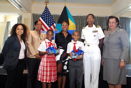 U.S. Ambassador to The Bahamas Nicole A. Avant donated $10,000 in books to the Ministry of Education Oct. 5 to support the United States Embassy-initiated “Read To Lead” program. Funding for the book donation was provided by the U.S. Northern Command as part of its long-standing partnership with the island nation. On hand for the official book handover was Deputy Assistant Secretary, Western Hemisphere Affairs, Julissa Reynoso; Delores Ingraham, President, New Providence Association of Public High Schools; Alexis Thompson, student, Sadie Curtis Primary School; U.S. Ambassador Nicole A. Avant, Reagan Cartwright, student, Sadie Curtis Primary School; Navy Lt. Cmdr. Janice Smith, Chief of the U.S. Office of Defense Coordination and Permanent Secretary and Ministry of Education Elma Garraway. 


