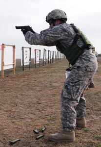 Sgt. 1st Class Antonio Turberville, operations noncommissioned officer, Headquarters Support Company, Army North, fires an M-9 Berretta Pistol during advanced marksmanship training Jan. 20 at the Camp Bullis Military Training Reservation in San Antonio. 
