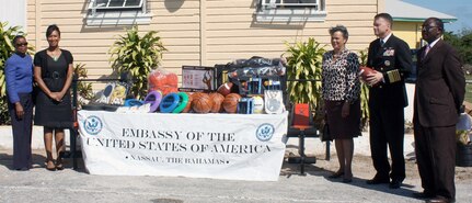 Adm. James Winnefeld, NORAD and USNORTHCOM commander, provides motivational remarks to students at the Simpson Penn Centre for Boys in Nassau, The Bahamas, on Feb. 9, 2011. The commander, accompanied by U.S. Ambassador Nicole Avant and Bahamian Minister of State in the Ministry of Labor and Social Development Loretta Butler-Turner, donated sports equipment to the centre. The donation was funded by USNORTHCOM’s Theater Security Cooperation Humanitarian Assistance Program. 
