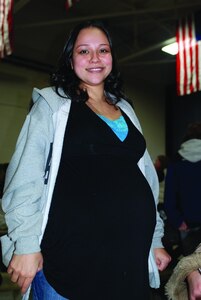 Johana Ortiz would not let labor pains keep her from meeting her husband, Spc. Melvin Ortiz of the Wisconsin National Guard, upon his return from a year-long deployment to Iraq Jan. 13, 2009.