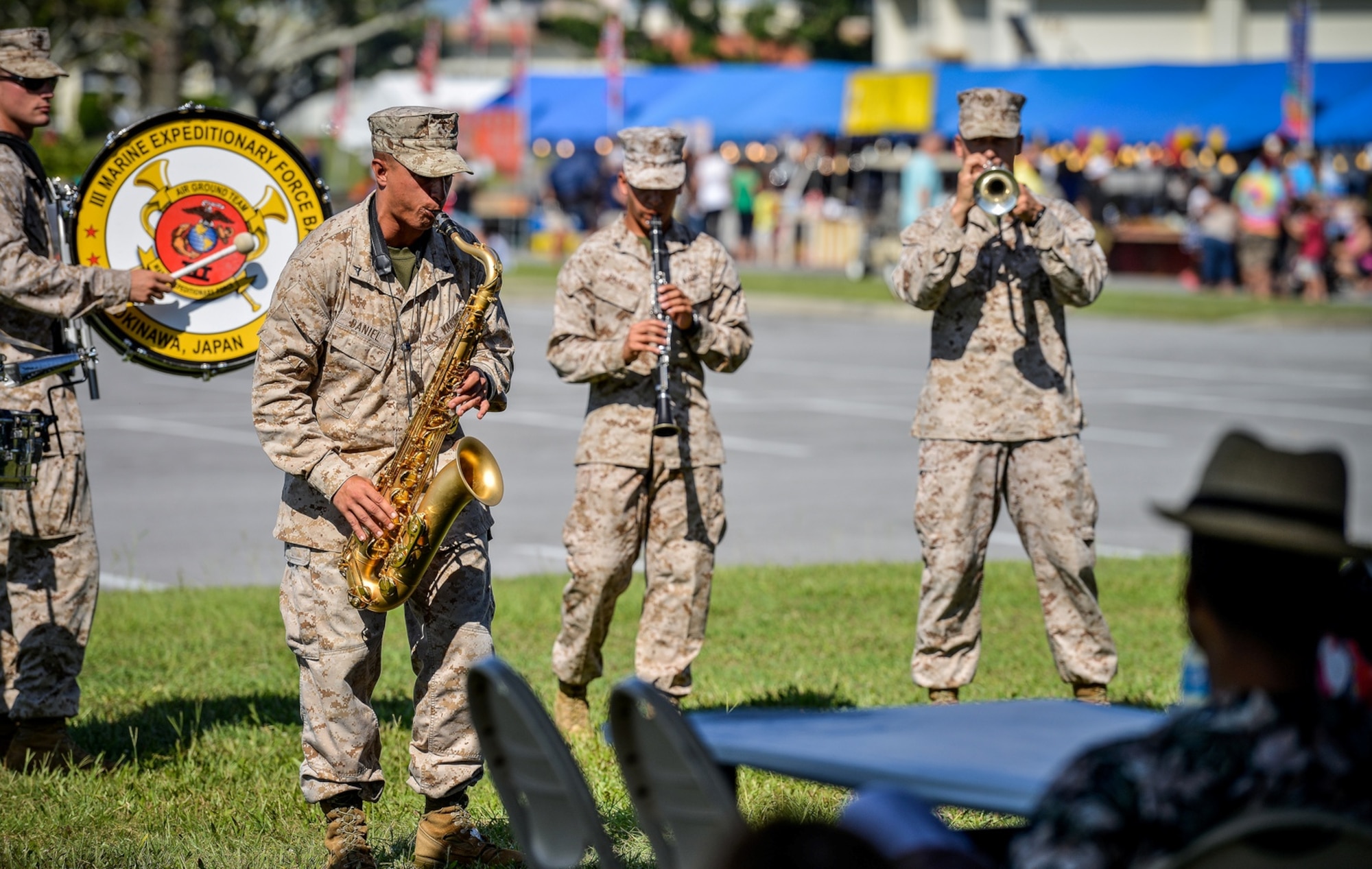 Members of the III Marine Expeditionary Force Band's Party Band entertain participants during the 18th Force Support Squadron's Rockin' the Block on Kadena Air Base, Japan, June 29, 2013. About 10,000 people attended the event. (Courtesy photo by Ryan Burger/Released)