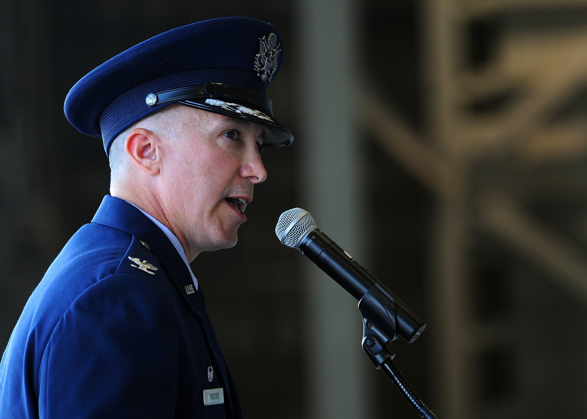 Col. David Pastore, 15th Maintenance Group commander, addresses his new command during a change of command ceremony at Hangar 19 on Joint Base Pearl Harbor-Hickam, Hawaii, July 9, 2013. Pastore arrived from Scott Air Force Base, Ill., where he was the Director of Logistics Maintenance within Headquarters Air Mobility Command. (U.S. Air Force photo/Tech. Sgt. Jerome S. Tayborn)