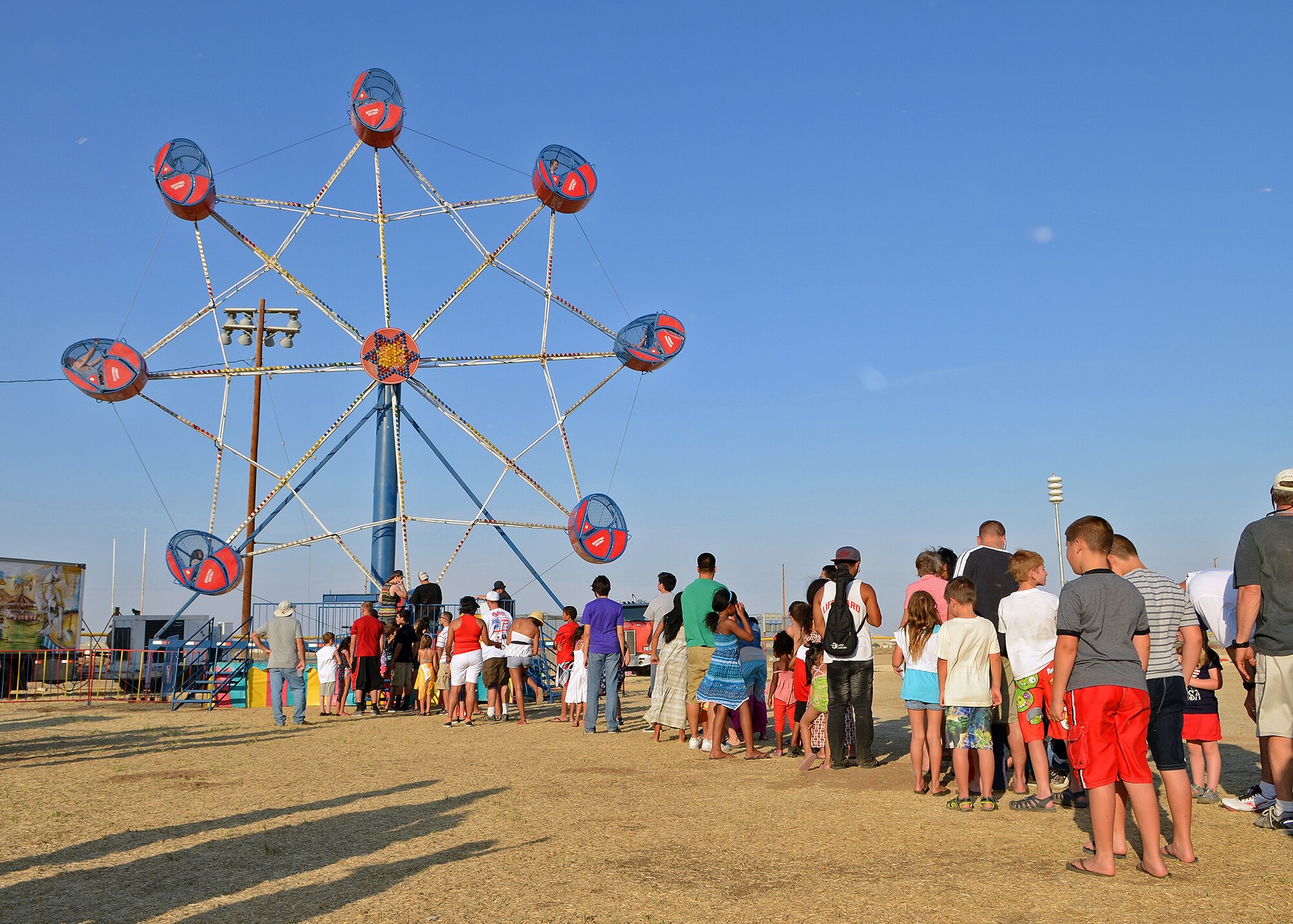 A ferris wheel was one of the many rides that were available for those in attendance during the 2013 Freedom Fest at Roberts Field on July 4. (U.S. Air Force photo by Jet Fabara)
