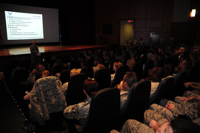 Col. Darren Hartford, 437th Airlift Wing commander, speaks to Airmen and civilians during a sexual assault awareness briefing June 28, 2013, in the Base Theater, at Joint Base Charleston – Air Base, S.C.  JB Charleston hosted a Sexual Assault Prevention and Response Stand Down Day, which consisted of three “All Calls” hosted by senior leadership. Additionally, all 628th Air Base Wing and 437th AW squadrons held their own group discussions to talk about sexual assault awareness. (U.S. Air Force photo/Staff Sgt. Rasheen Douglas)
