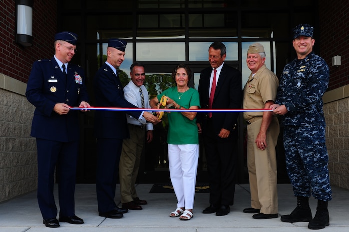 (From left to right) Lt. Col. Aaron Altwies, 628th Civil Engineer Squadron commander, Col. Justin Davey, 628th Mission  Support Group commander, Erich Reichle, Project Manager and Sauer representative, Judy Anderson, 628th CES employee, Congressman Mark Sanford, Capt. Thomas Bailey, Joint Base Charleston deputy commander, and Lt. Cmdr. Ancelmo McCarthy, Resident Officer in Charge of Construction, cuts a ribbon during the official 628th Civil Engineering complex ribbon cutting on July 8, 2013, at Joint Base Charleston – Air Base, S.C. There was a guest appearance by Congressman Mark Sanford. The new CE building is 48,000 square feet and provides consolidation for a 462 person unit that constructs and maintains daily base operations. (U.S. Air Force photo/ Airman 1st Class Chacarra Neal)