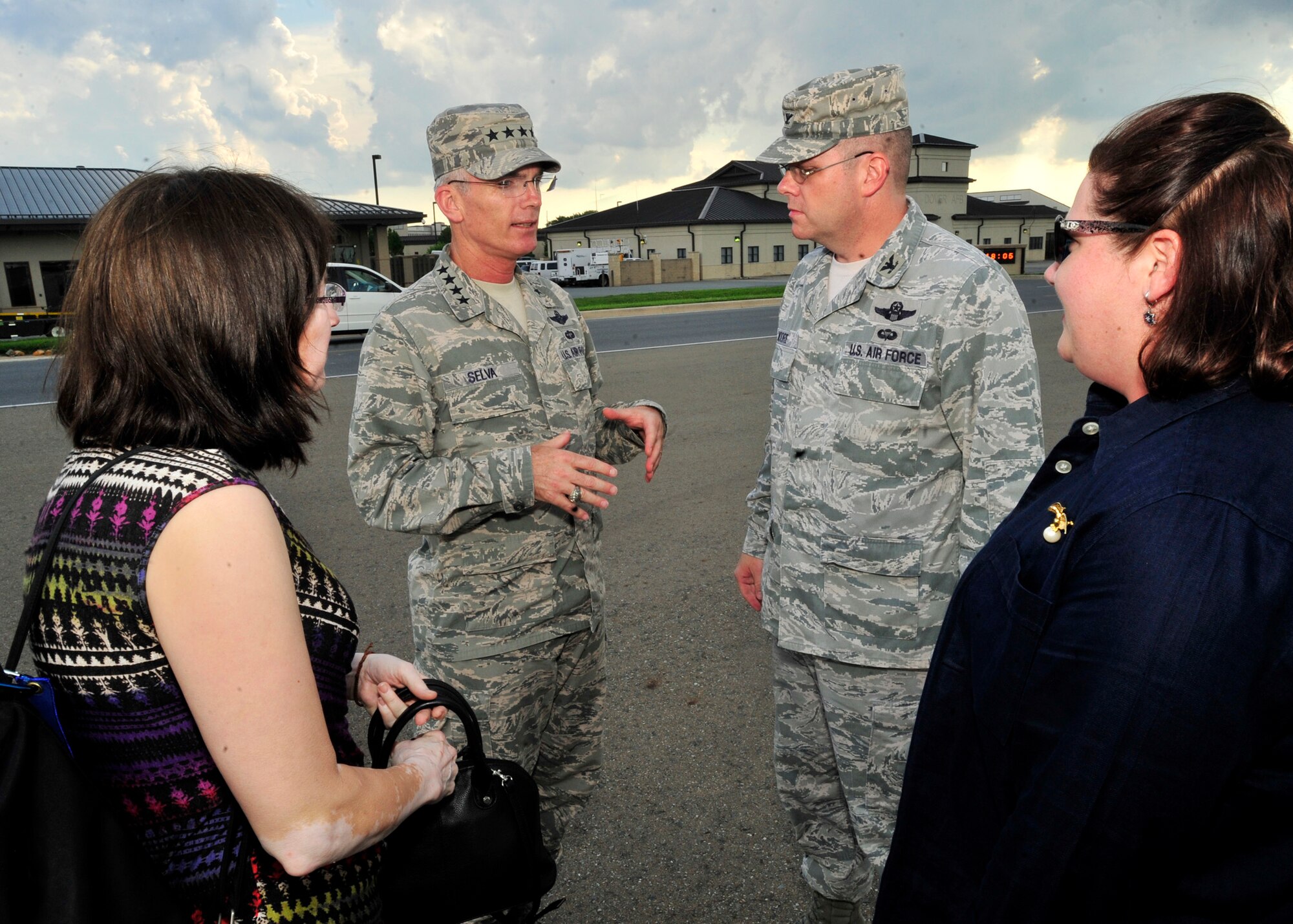 Gen. Paul J. Selva, Air Mobility Commander commander, speaks with Col. Rick Moore, 436th Airlift Wing commander, July 8, 2013, at the flightline on Dover Air Force Base, Del. Selva arrived at Dover for his second official visit as AMC commander. (U.S. Air Force photo/Tech. Sgt. Chuck Walker)
