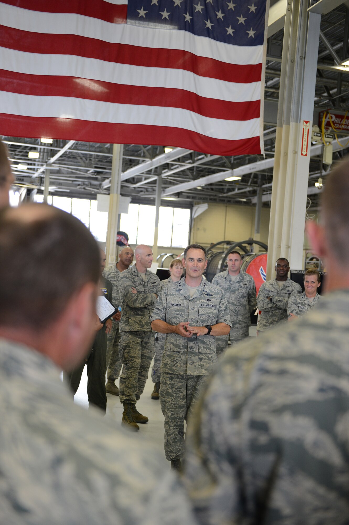 Maj. Gen. Jake Polumbo, 9th Air Force commander, speaks to members of the 20th Component Maintenance Squadron, propulsion flight, during a tour of 20th Fighter Wing at Shaw Air Force Base, S.C., July 1, 2013. Polumbo visited many different squadrons across base during his tour like the 20th Medical Group and the 20th Logistics Readiness Squadron. (U.S. Air Force photo by Airman 1st Class Krystal M. Jeffers/Released)
