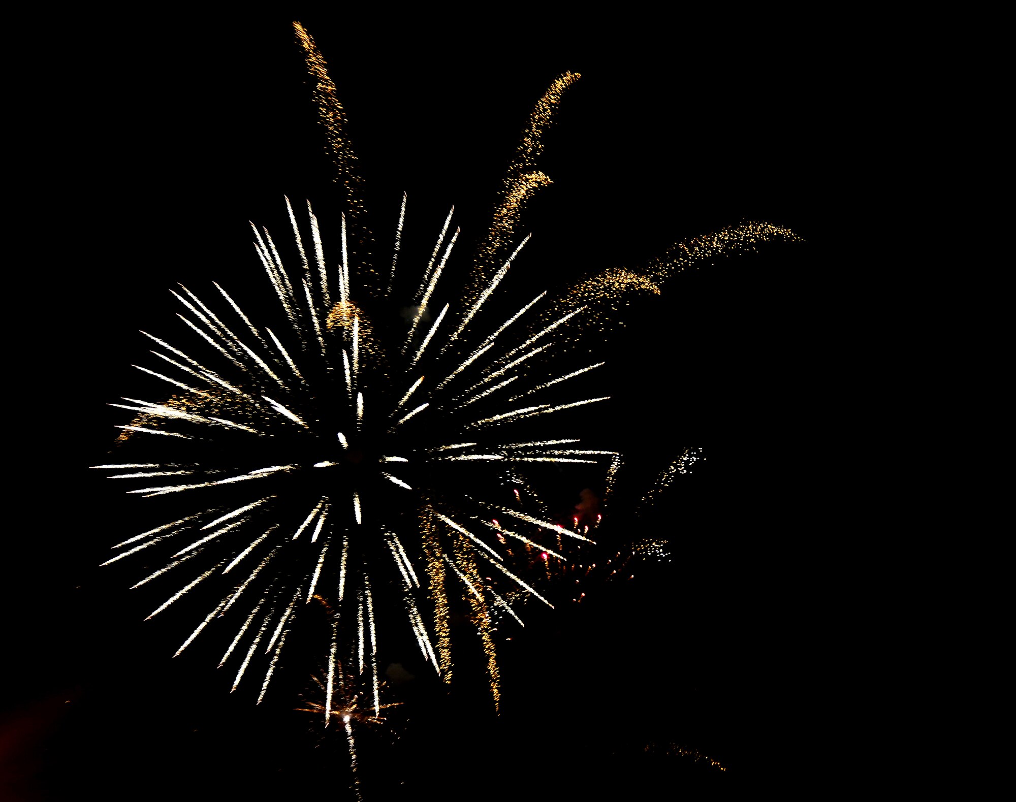 Fireworks provide entertainment for members of Team Incirlik during the Fourth of July celebration July 4, 2013, at Incirlik Air Base, Turkey. Members of Team Incirlik gathered together to enjoy games, food, music and fireworks during the event. (U.S. Air Force photo by Staff Sgt. Eric Summers Jr./Released)