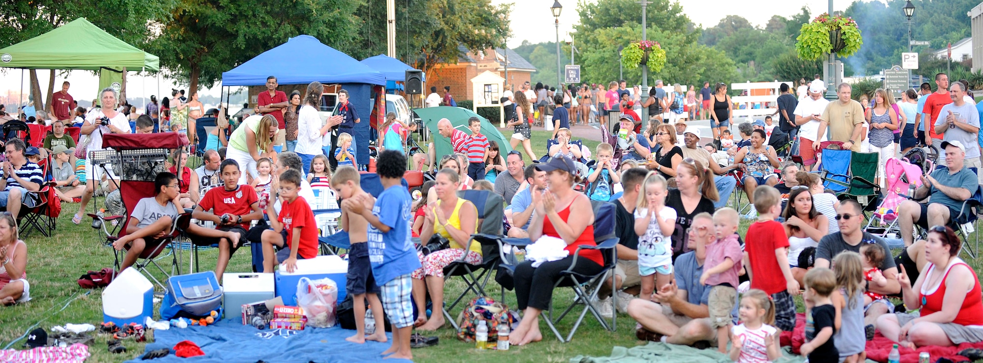 Crowd members enjoy the U.S. Army Training and Doctrine Command Band New Orleans Jazz Ensemble performance during the 34th annual Yorktown, Va. Fourth of July Celebration, July 4, 2013. The event also included an Independence Day 8K Run and 5K Walk, parade, bell-ringing ceremony and fireworks display. (U.S. Air Force photo by Staff Sgt. Dana Hill)