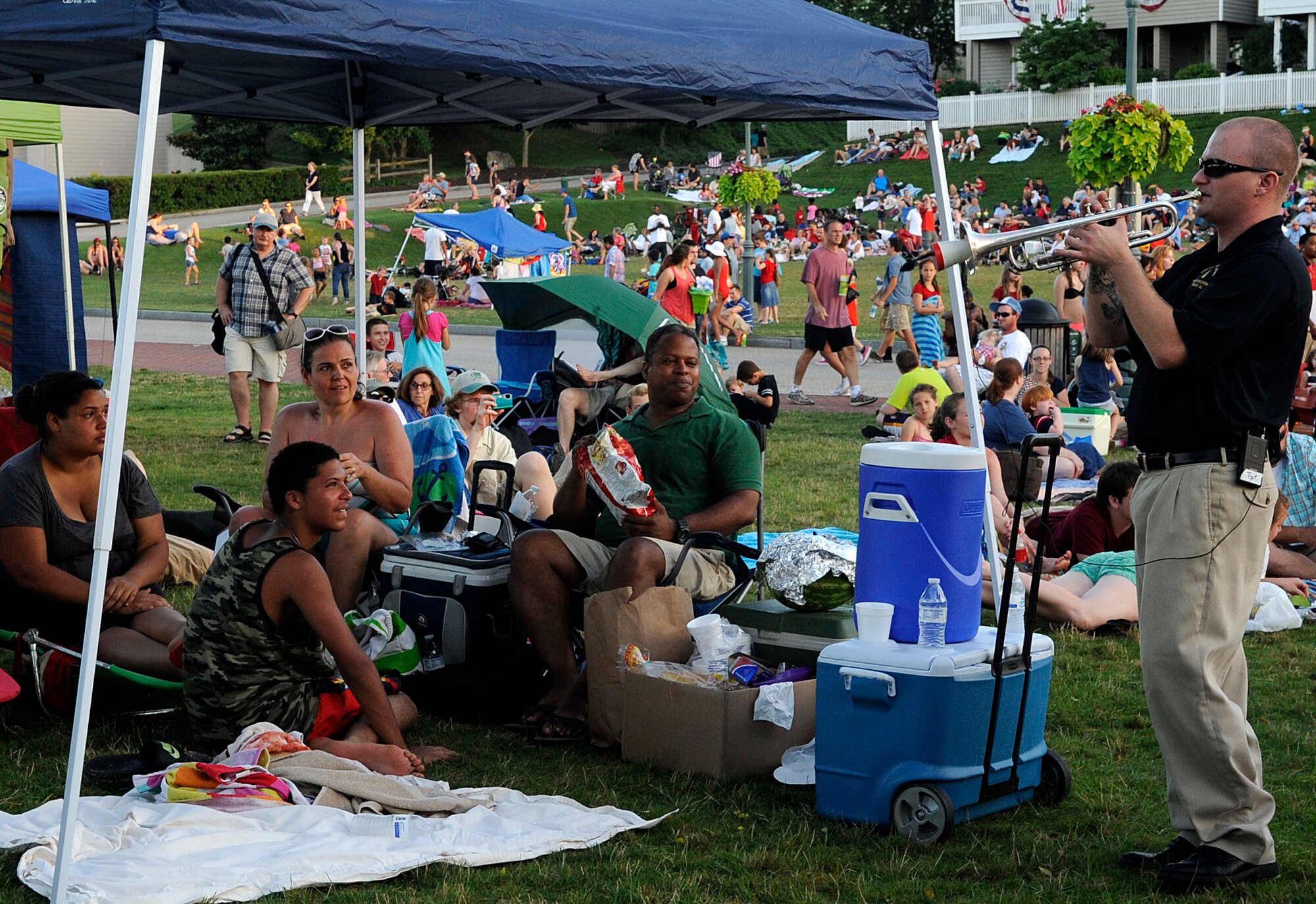 U.S. Army Sgt. Matthew Fattal, U.S. Army Training and Doctrine Command Band New Orleans Jazz Ensemble trumpet player and vocalist, plays for audience members during the 34th annual Yorktown, Va. Fourth of July Celebration, July 4, 2013. The event also included an Independence Day 8K Run and 5K Walk, parade, bell-ringing ceremony and fireworks display. (U.S. Air Force photo by Staff Sgt. Dana Hill)
