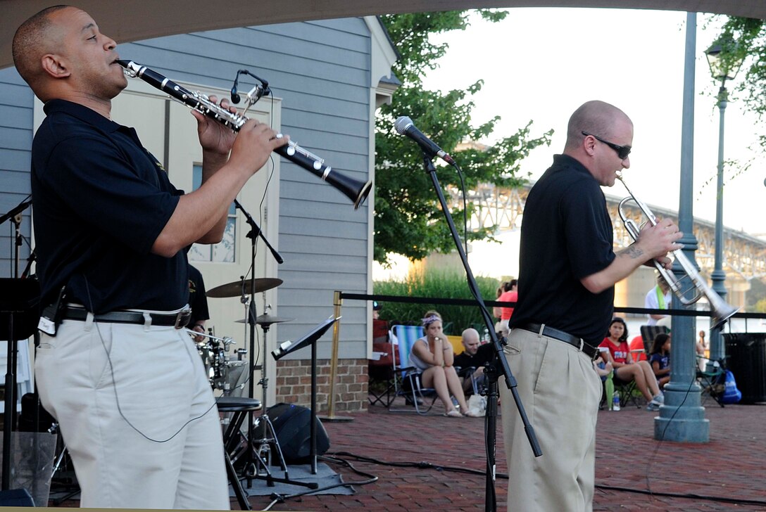 (From left) U.S. Army Master Sgt. Steven King, U.S. Army Training and Doctrine Command Band New Orleans Jazz Ensemble clarinet player, and U.S. Army Sgt. Matthew Fattal, TRADOC Band New Orleans Jazz Ensemble trumpet player and vocalist, perform during the 34th annual Yorktown, Va. Fourth of July Celebration, July 4, 2013. The event also included an Independence Day 8K Run and 5K Walk, parade, bell-ringing ceremony and fireworks display. (U.S. Air Force photo by Staff Sgt. Dana Hill)