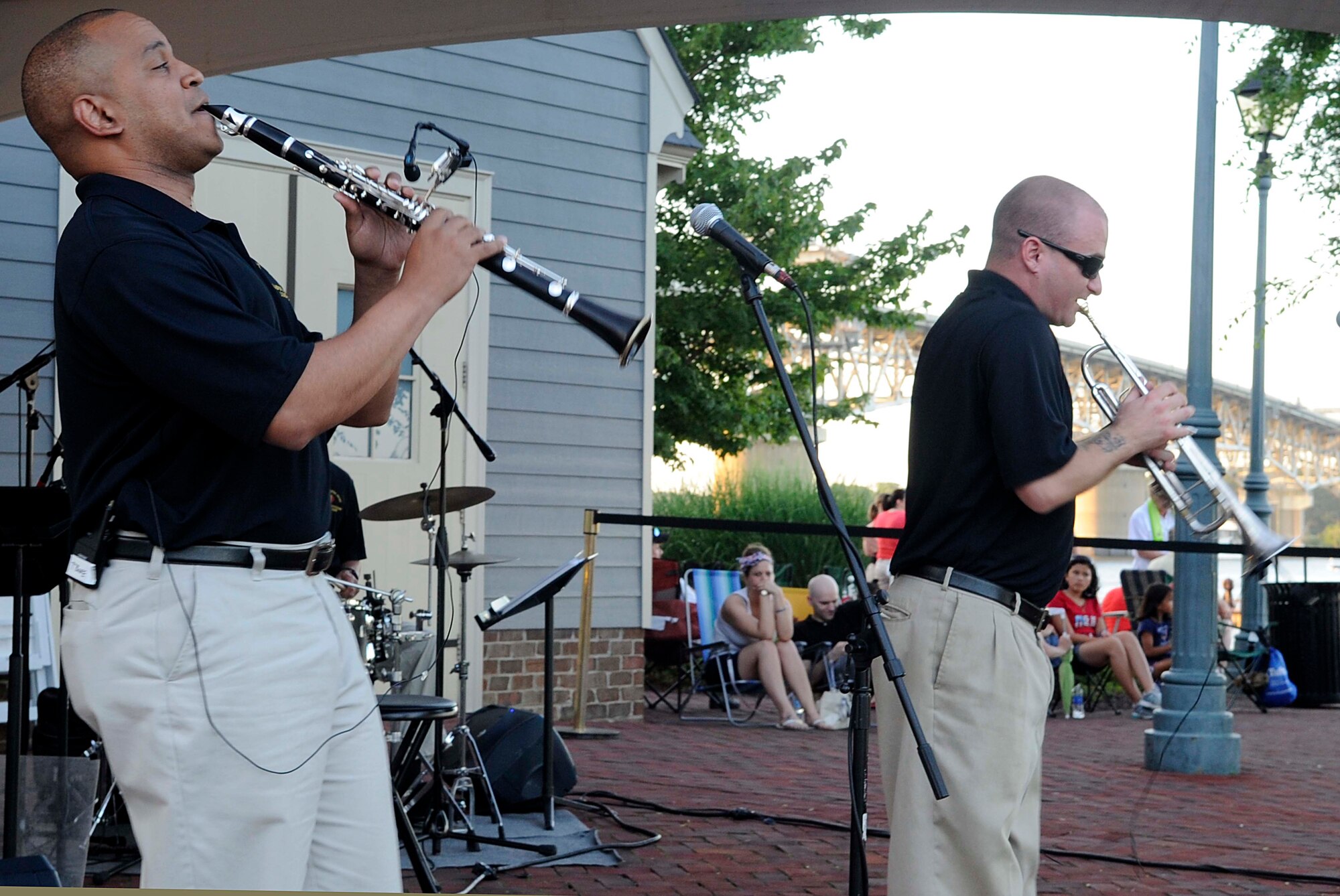 (From left) U.S. Army Master Sgt. Steven King, U.S. Army Training and Doctrine Command Band New Orleans Jazz Ensemble clarinet player, and U.S. Army Sgt. Matthew Fattal, TRADOC Band New Orleans Jazz Ensemble trumpet player and vocalist, perform during the 34th annual Yorktown, Va. Fourth of July Celebration, July 4, 2013. The event also included an Independence Day 8K Run and 5K Walk, parade, bell-ringing ceremony and fireworks display. (U.S. Air Force photo by Staff Sgt. Dana Hill)