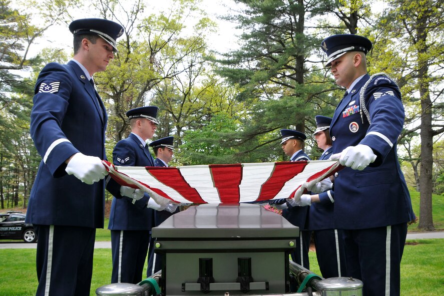 BEDFORD, Mass. -- Members of the Patriot Honor Guard perform a seven-member funeral detail at a local cemetary last year. Due to the impact sequestration has on resources, Air Force Services is adjusting requirements for military funeral honors of retirees. The Patriot Honor Guard will revert to requiring a minimum of two personnel for retiree funeral details. (U.S. Air Force photo by Linda LaBonte Britt)