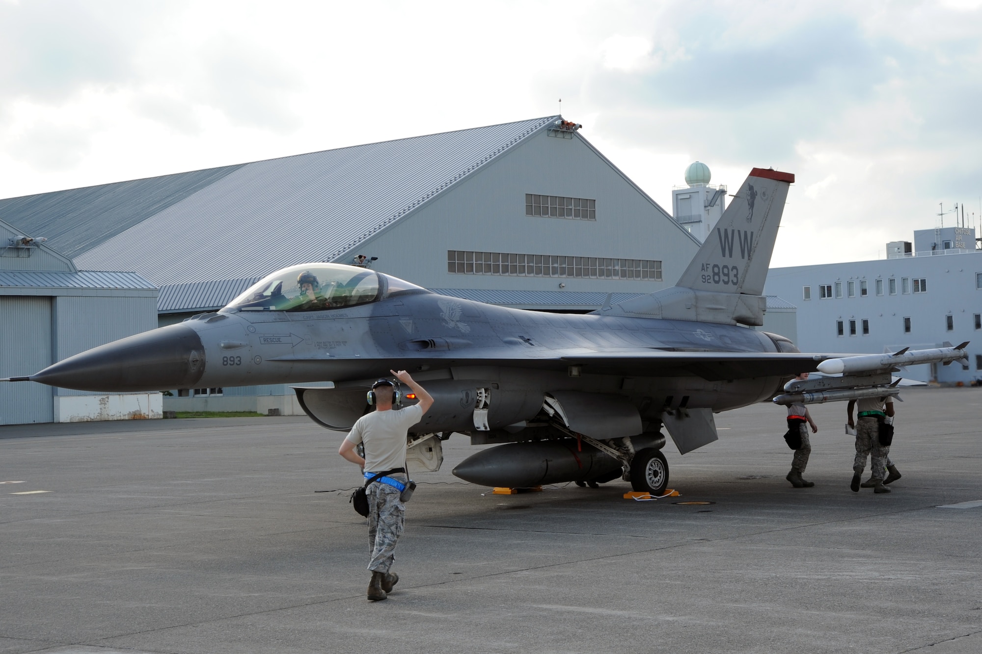 1st Lt. Michelle Hamland, 13th Fighter Squadron, parks a U.S. Air Force F-16 Fighting Falcon following a training mission with F-15Js of the Japan Air Self-Defense Force, at Chitose Air Base, Japan, July 9, 2013. Around 75 maintainers from the 13th Aircraft Maintenance Unit supported flying operations for a weeklong Aviation Training Relocation mission. (U.S. Air Force photo/Senior Airman Derek VanHorn)