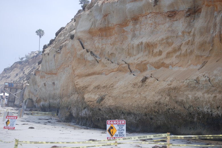 A jagged crack near the base of a bluff at Encinitas, Calif., is an early indication that the bluff will fail. A Corps study for Encinitas and nearby Solana Beach proposes restoration efforts to protect the shoreline, making circumstances such as this less likely.