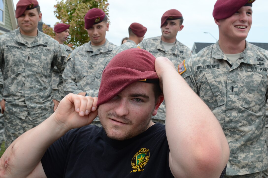 Army Cpl. Cody Stanton wears his beret for the first time since he was injured in Afghanistan in January 2012. Stanton became a double amputee after stepping on an improvised explosive device. U.S. Army photo by Sgt. Barry St. Clair