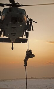 A pararescuemen from the Alaska Air National Guard's 212th Rescue Squadron conducts fast rope insertion training while deployed to Bagram Air Base, Afghanistan. Members of the Alaska Air National Guard deployed to Afghanistan in 2008 and were credited with saving 72 lives.