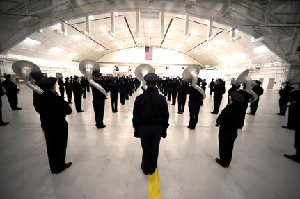 TSgt. Doug Mattsey is one of five tuba players in the 99-piece U.S. Air Force band, which practiced inside a hangar in preparation of its parade performance for the inauguration of President-elect Barack Obama. The practice took place on Andrews Air Force Base, Jan. 7, 2009.