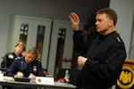 Navy Adm. James "Sandy" Winnefeld, commander of U.S. Northern Command, speaks to senior Guard officers and enlisted leaders during the 2011 General Senior Leadership Conference at Arlington Hall in Arlington, Va., Feb. 28, 2011. Winnefeld talked with the adjutant generals about the contingency dual-status commander concept, which would create better cooperation between federal and state assets during a disaster. 
