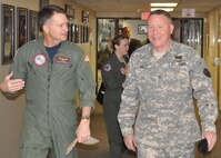NORAD and USNORTHCOM Commander, Adm. James Winnefeld, left, is escorted by the Joint Task Force North Commanding General, Army Brig. Gen. Michael A. Bills, during his visit to Fort Bliss, Texas, March 3. JTF North is the Department of Defense organization tasked to support the nation’s federal law enforcement agencies in the identification and interdiction of suspected transnational threats within and along the approaches to the continental United States. 
