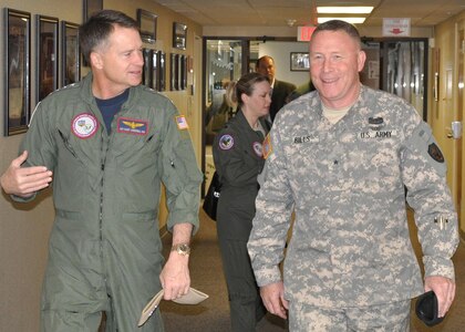 NORAD and USNORTHCOM Commander, Adm. James Winnefeld, left, is escorted by the Joint Task Force North Commanding General, Army Brig. Gen. Michael A. Bills, during his visit to Fort Bliss, Texas, March 3. JTF North is the Department of Defense organization tasked to support the nation’s federal law enforcement agencies in the identification and interdiction of suspected transnational threats within and along the approaches to the continental United States. 
