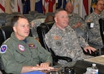 NORAD and USNORTHCOM Commander, Adm. James Winnefeld, left, is given an update briefing by the Joint Task Force North Commanding General, Army Brig. Gen. Michael A. Bills, during his visit to Fort Bliss, Texas, March 3. Topics of discussion included the task force’s on-going and future homeland security operations executed in support of the nation’s law enforcement agencies at locations throughout the USNORTHCOM area of responsibility. 
