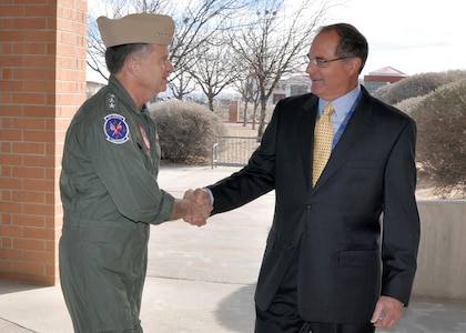 El Paso Intelligence Center Director, Art Doty, right, welcomes the NORAD and USNORTHCOM Commander, Adm. James Winnefeld, to the Drug Enforcement Administration’s facility located at Fort Bliss, Texas. JTF North, an element of USNORTHCOM, supports the law enforcement agencies that conduct operations at the center. EPIC is a regional intelligence center designed to collect and disseminate information relating to drug, alien, and weapon smuggling in support of field enforcement entities throughout the region. Agencies currently represented at EPIC include the Drug Enforcement Administration; Department of Homeland Security; Customs & Border Protection; Immigration & Customs Enforcement; U.S. Coast Guard; Federal Bureau of Investigation; Bureau of Alcohol, Tobacco, Firearms and Explosives; U.S. Secret Service; U.S. Marshals Service; National Drug Intelligence Center; Internal Revenue Service; U.S. Department of the Interior; National Geospatial–Intelligence Agency; U.S. Department of Defense; Joint Task Force–North; Joint Interagency Task Force–South; Texas Department of Public Safety; Texas Air National Guard; and the El Paso County Sheriff’s Office. 
