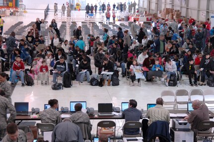 More than 140 military dependents prepare to process through the Denver International Airport aerial port of debarkation March 24. DIA, Seattle-Tacoma International Airport, Wash., and Travis Air Force Base, Calif., are receiving flights of military dependents who voluntarily left Japan as part of Operation Pacific Passage following the earthquake and tsunami that struck Japan March 11. 

