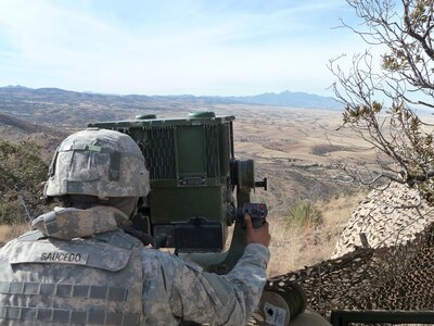 Spc. Arturo Saucedo, cavalry scout, Apache Troop, 1st Squadron, 13th Cavalry, surveys the Arizona – Mexico border for suspected illegal activities using a Long Range Scout Surveillance System (LRAS). The ‘Warhorse’ Cavalry Scouts reported their observations to the U.S. Border Patrol agents in the field. 

