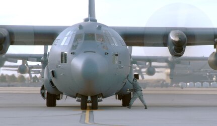 A crew chief with the 302nd Airlift Wing locks up a C-130 in preparation for take-off at Peterson Air Force Base, Colo., April 16. Aircraft and crews from the 302nd AW have been assigned to assist the Mexican government in fighting wildland fires in Northern Mexico using a Modular Airborne Firefighting System loaded onto two C-130 aircraft. The MAFFS, which is owned and maintained by the U.S. Forest Service, is a pressurized self-contained firefighting system designed for installation in C-130 aircraft without structural modifications to the aircraft. The system is designed to air-drop fire-retardant chemicals onto wildfires. 

