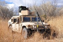 Spc. Derek Armstrong employs a Long Range Scout Surveillance System (LRAS) mounted on High Mobility Multi-Purpose Wheeled Vehicle (HMMWV). The LRAS has both day and night surveillance capabilities. The ‘Warhorse’ Cavalry Scouts reported their observations to the U.S. Border Patrol agents in the field. 

