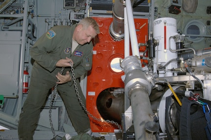 Senior Master Sgt. John Eichenberg, 302nd Airlift Wing loadmaster, secures a Modular Airborne Firefighting System aboard a C-130 in preparation for take-off at Peterson Air Force Base, Colo., April 16. Aircraft and crews from the 302nd AW have been assigned to assist the Mexican government in fighting wildland fires in Northern Mexico using MAFFS loaded onto two C-130 aircraft. The MAFFS, which is owned and maintained by the U.S. Forest Service, is a pressurized self-contained firefighting system designed for installation in C-130 aircraft without structural modifications to the aircraft. The system is designed to air-drop fire-retardant chemicals onto wildfires. 

