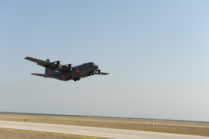 A C-130 equipped with a U.S.D.A. Forest Service Modular Airborne Fire Fighting System departs here April 17 to fight a wildfire in a neighborhood in Austin April 17. U.S. Northern Command has deployed six C-130 aircraft fitted with MAFFS to support the battle against ongoing wildfires in the area. 

