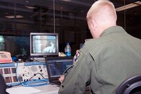 Capt. Kenneth Moerscher, a representative on the Joint Task Force Space - Transportation System team from the Air Force Rescue Coordination Center, monitors a shuttle launch from the Morrell Operations Center at Cape Canaveral Air Force Station, Fla. 

