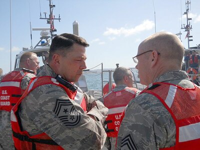 Air Force Chief Master Sgt. Allen Usry, North American Aerospace Defense Command and U.S. Northern Command Command Senior Enlisted Leader, speaks with the Air Forces Northern Command Chief, Air Force Chief Master Sgt. Joe Thornell, during a recent visit to U.S. Coast Guard Station San Diego June 2. The visit was part of the 5th Annual Senior Enlisted Leadership North American Borders Conference, which brought representatives from across Northern Command, Canada Command and the National Guard together to discuss border security, joint and international activities, training and development opportunities and future activities that could affect North America. 

