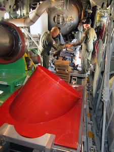 Master Sgt’s. Lamont Wood and Scott Agenbroad from the Air Force Reserve Command's 302nd Airlift Wing based at Peterson AFB, Colo., ready their cargo of Modular Airborne Fire Fighting System equipment for transport to Kirtland Air Force Base, N.M., to assist the wildfire fighting effort across Arizona and New Mexico. 


