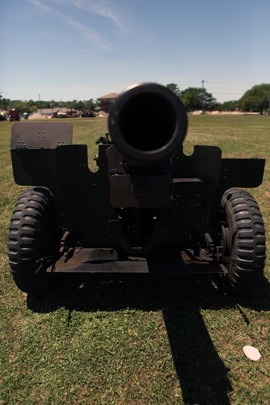 A 155 mm Howitzer rests after being fired during a Memorial Day 21 gun salute at the parade deck May 27. More than two dozen residents and veterans attended the ceremony. Four Howitzers fired blank rounds. Blank rounds are used during ceremonies for their visual effect and for safety. The garrison flag flew at half-mast during the ceremony.