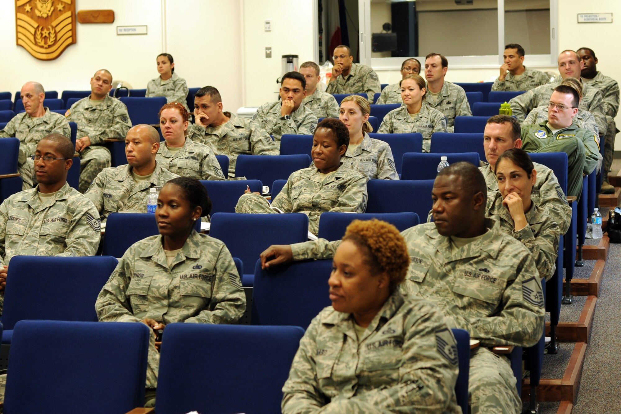 YOKOTA AIR BASE, Japan -- Attendees listen intently during a discussion at Yokota First Sergeant Council’s Diamond Mentoring Seminar July 9, 2013, at Yokota Air Base, Japan. Forty-five Airmen, one Marine and one Soldier attended the seminar to learn about the duties of a first sergeant. “This seminar gives attendees a general starting point to know where to go and how to start many processes we as first sergeants deal with on a daily basis,” said Master Sgt. Jason Stacy, 374th Civil Engineer Squadron first sergeant. “We don’t expect them to know everything, but this gives them a general knowledge to use later in their careers or while assisting as an additional duty first sergeant.” (U.S. Air Force photo by Senior Airman Desiree Economides)