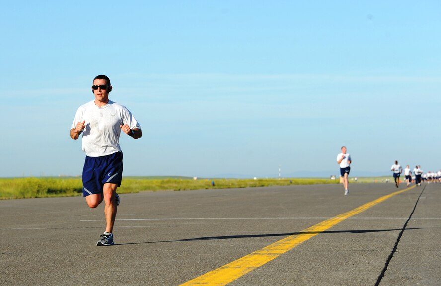 Staff Sgt. R.J. Biermann, 341st Missile Wing Public Affairs NCO in charge, nears the finish of a fun run on the Malmstrom Air Force Base flightline on July 3. Biermann finished the 1.5-mile run in third place. (U.S. Air Force photo/Capt. Chase McFarland)