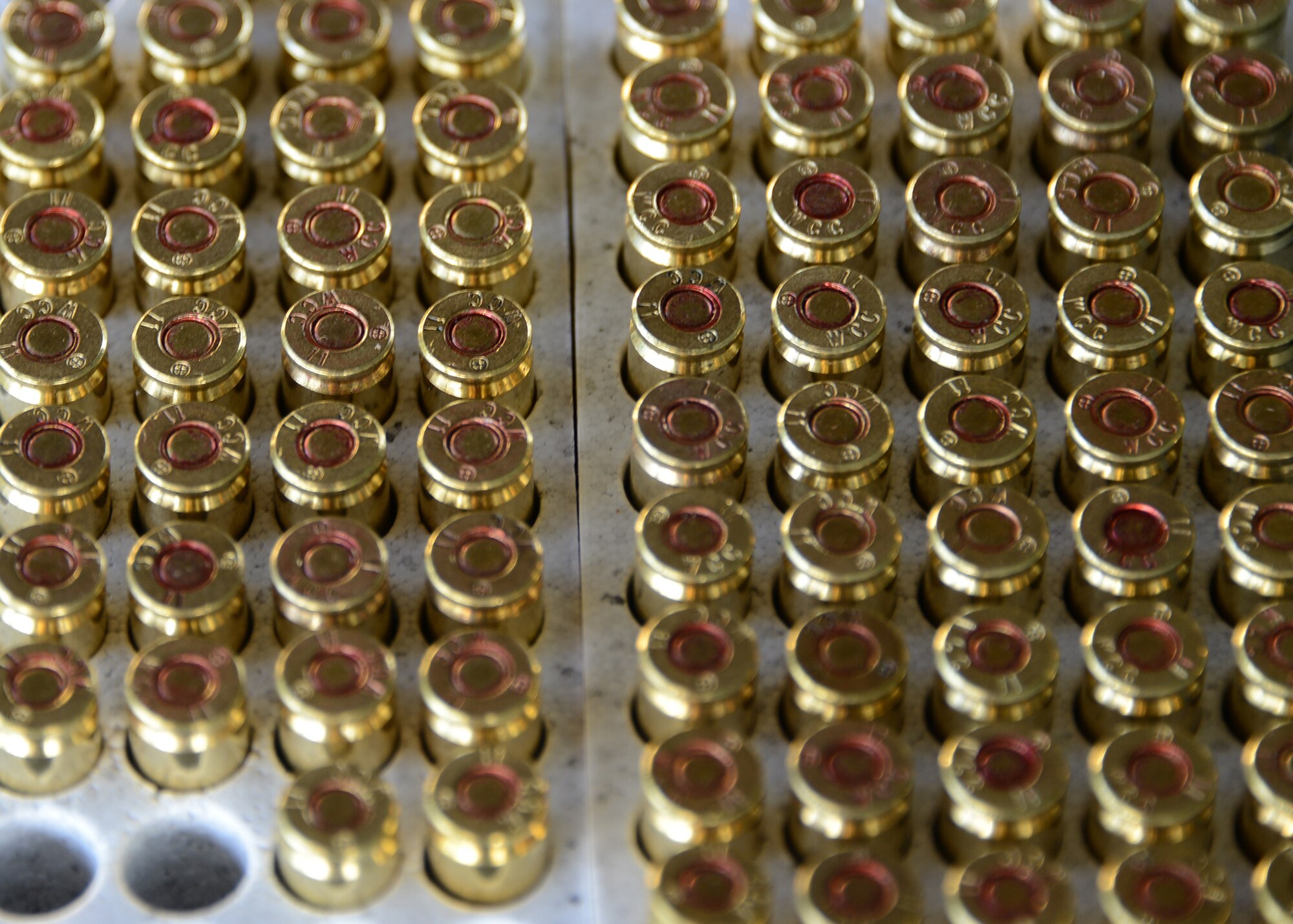 A carton of 9mm ammunition for a marksmanship challenge sits at the Combat Arms Training and Maintenance range at Hurlburt Field, Fla., June 28, 2013. (U.S. Air Force photo by Capt. Belena S. Marquez/Released)