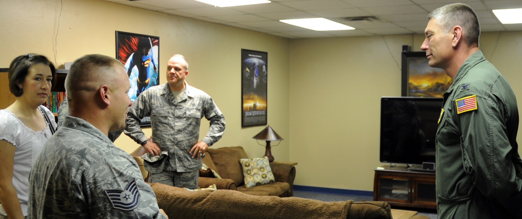 ALTUS AIR FORCE BASE, Okla. – Tech Sgt. Jonathan Mathe, 97th Air Mobility Wing NCO in charge of chapel operations, leads Col. Bill Spangenthal, 97th AMW commander, on a tour of the Airman Resilience Center, July 11.  Spangenthal toured the facility with chapel staff to gain a perspective of what the ARC has to offer. The ARC houses the Airman’s Ministry Center in addition with the Airman’s Attic and food pantry. (U.S. Air Force photo by Airman 1st Class Franklin R. Ramos / Released)