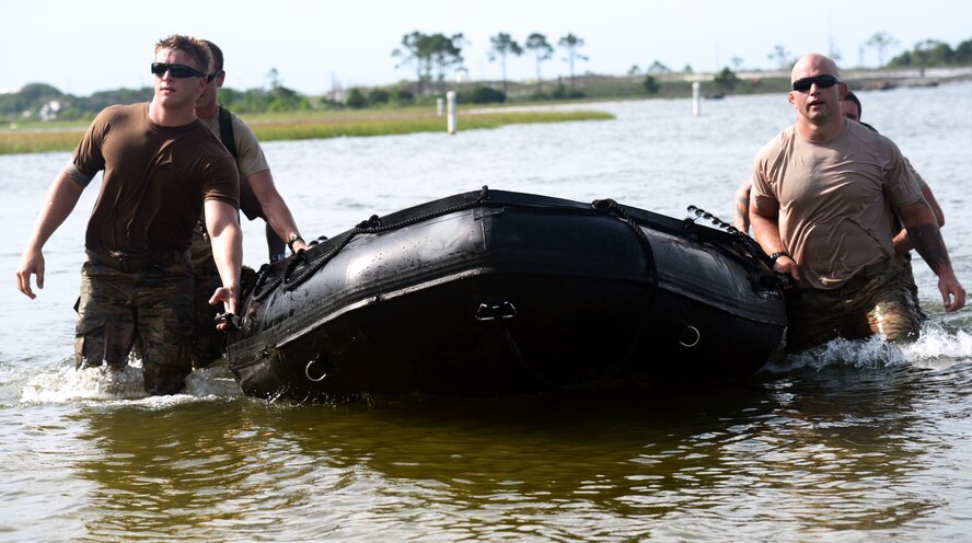 Air Commandos assigned to the 23rd Special Tactics Squadron remove their zodiac from the Santa Rosa Sound during a Monster Mash June 28, 2013 at Hurlburt Field, Fla. (U.S. Air Force photo by Staff Sgt. Melanie Holochwost)